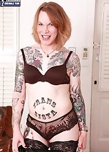Starshine Tara is a great girl with some stunning tattoos! She's got a fantastic all natural body, pale skin beneath those tats and a sexy pierce